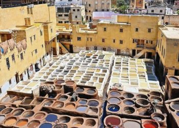 Chouara Tannery in Fes with colorful dyeing vats and traditional leather workers